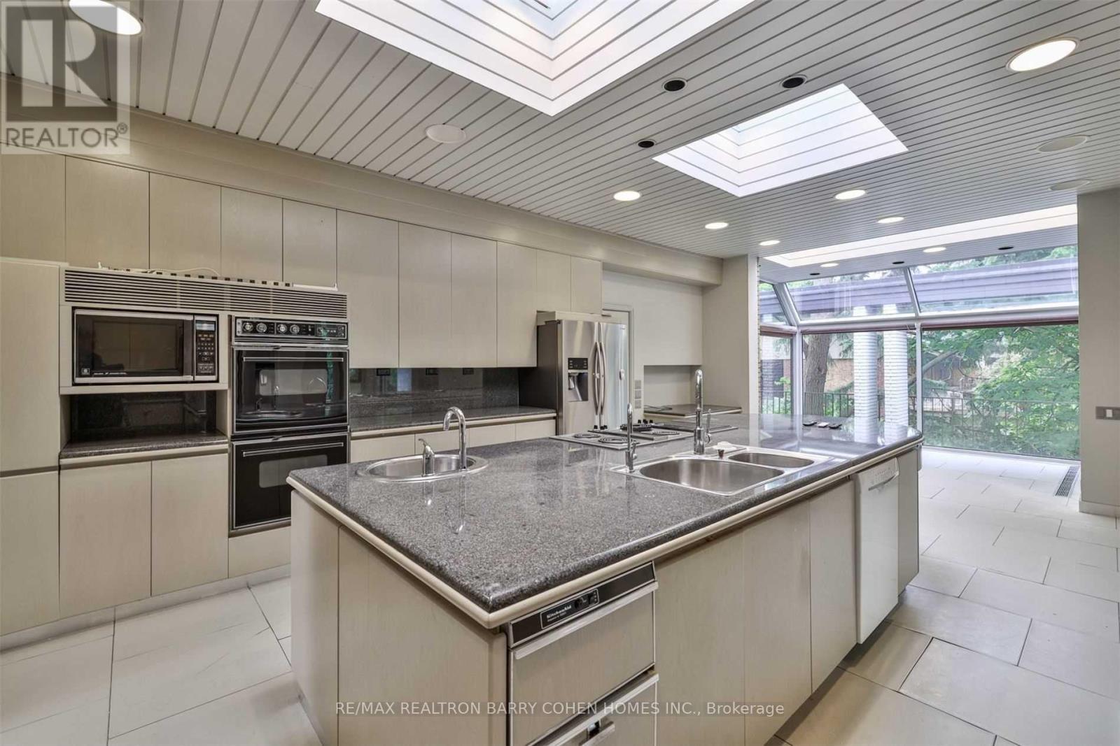 14 Park Lane Circle, Toronto, ON - Indoor Photo Showing Kitchen With Double Sink