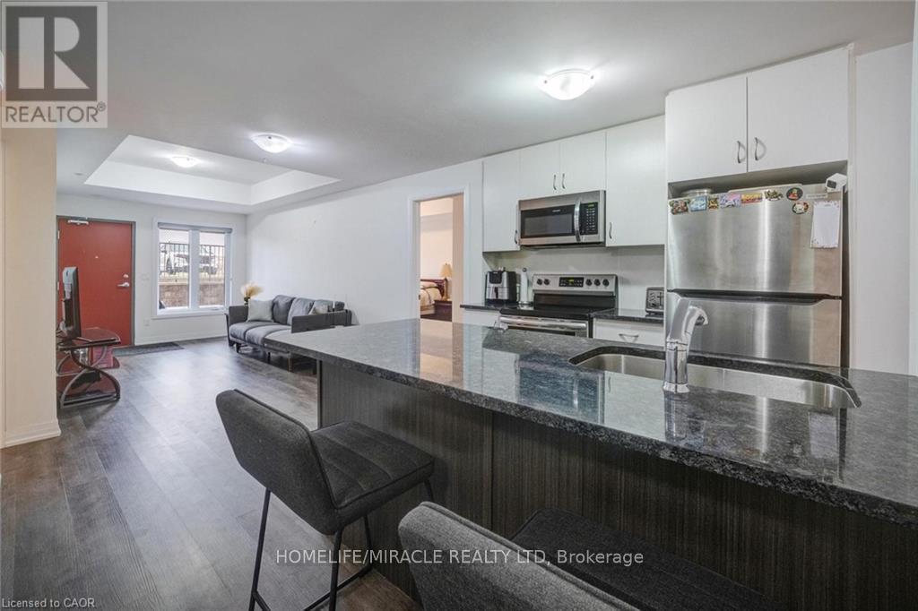 705 - 2635 William Jackson Drive, Pickering, ON - Indoor Photo Showing Kitchen With Stainless Steel Kitchen With Double Sink With Upgraded Kitchen