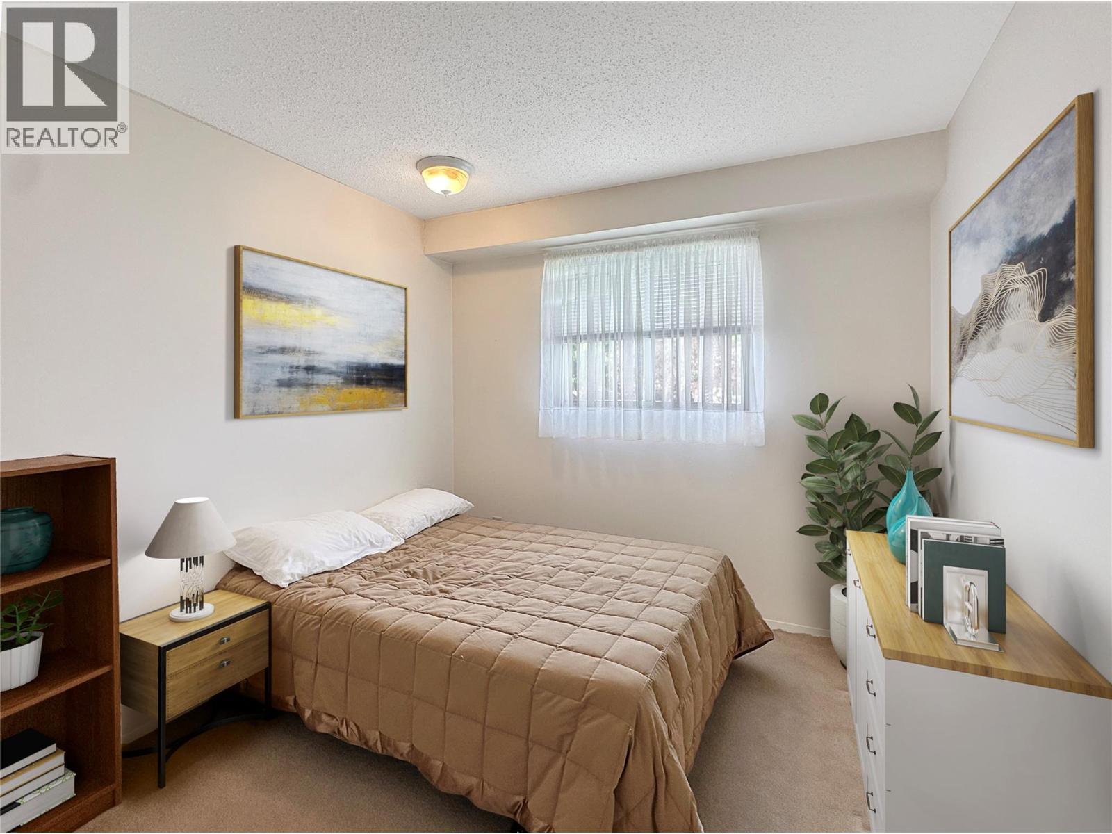 Virtually Staged - 2501 3Rd Street S, Cranbrook, BC - Indoor Photo Showing Bedroom