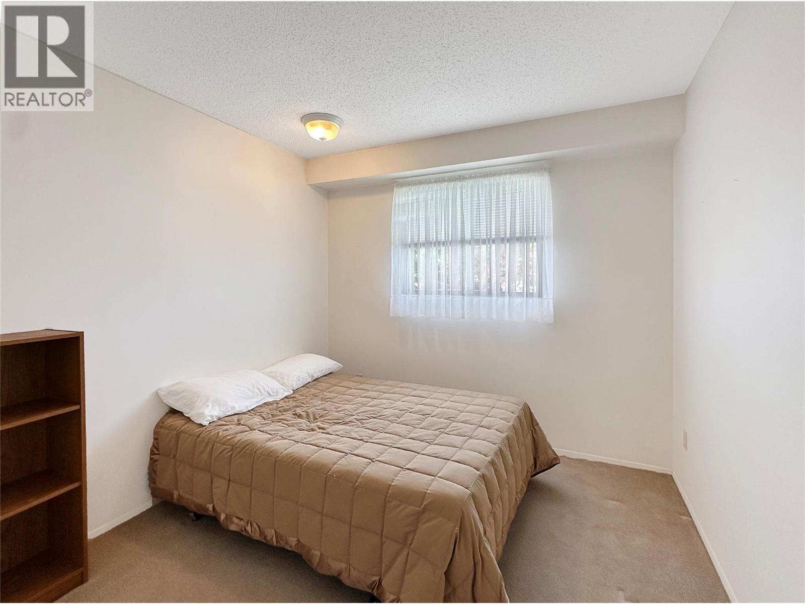 2501 3Rd Street S, Cranbrook, BC - Indoor Photo Showing Bedroom