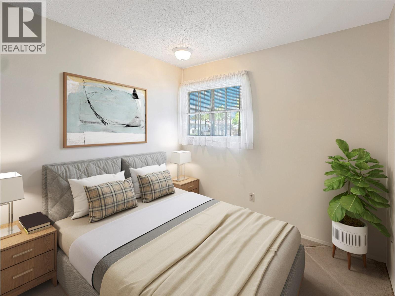 2501 3Rd Street S, Cranbrook, BC - Indoor Photo Showing Bedroom