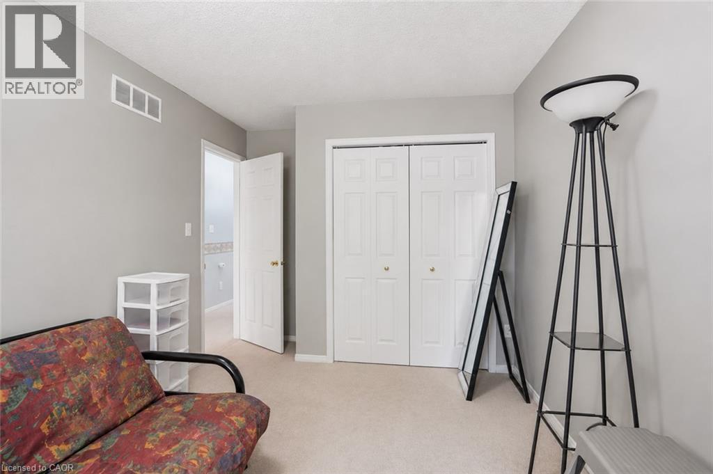 Virtually Staged - 565 Rymal Road E Unit# 2, Hamilton, ON - Indoor Photo Showing Other Room