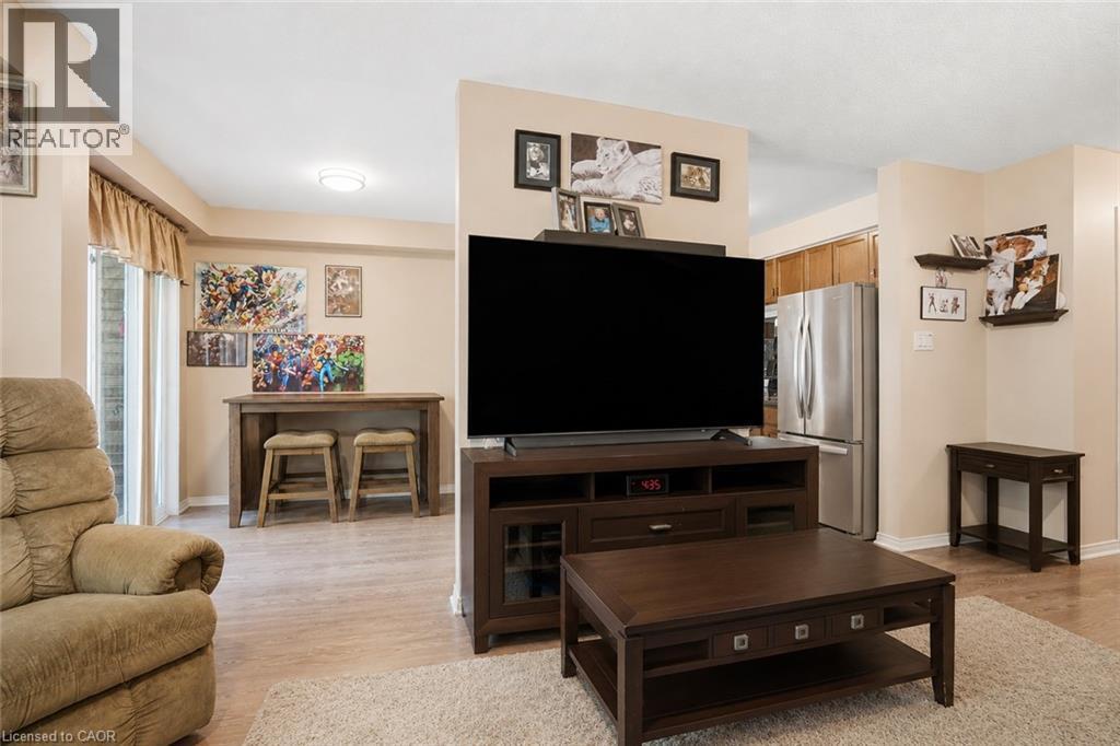 Virtually Staged - 565 Rymal Road E Unit# 2, Hamilton, ON - Indoor Photo Showing Living Room