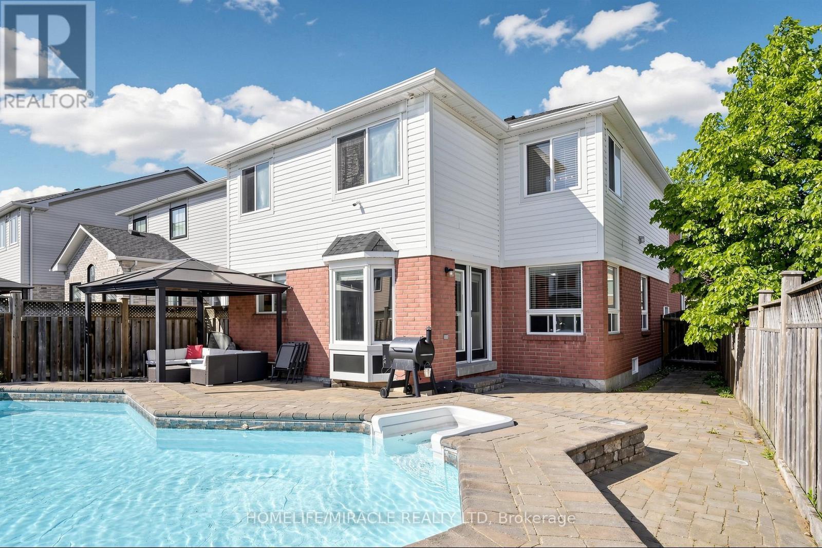 1026 Holdsworth Crescent, Milton, ON - Outdoor With In Ground Pool With Deck Patio Veranda