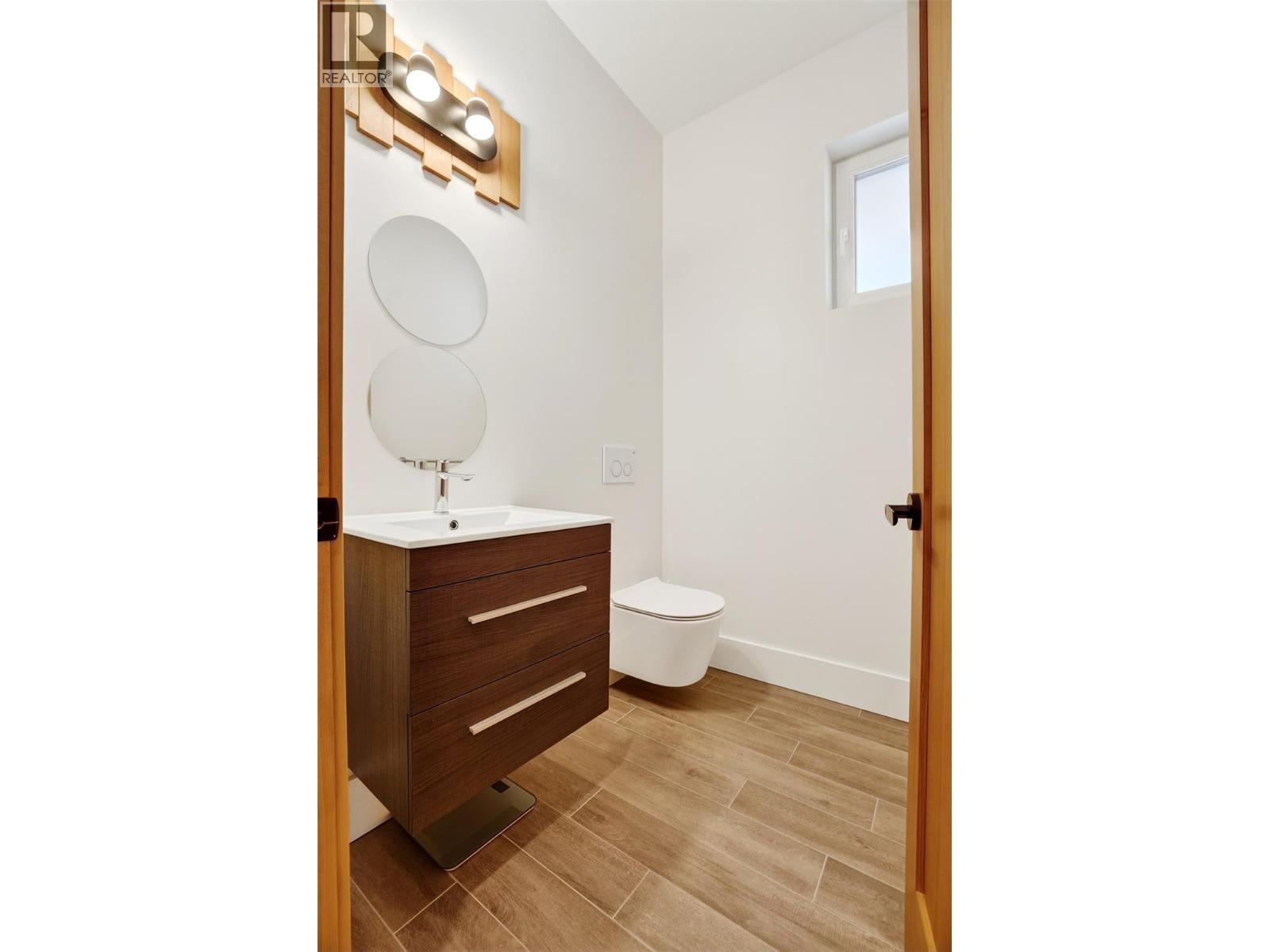 Powder Room Main - 6804 Grandview Drive, Nelson, BC - Indoor Photo Showing Bathroom