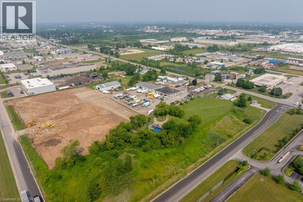 Expansive undeveloped lot featuring cleared land and partial tree coverage - 1264 Parkinson Road, Woodstock, ON