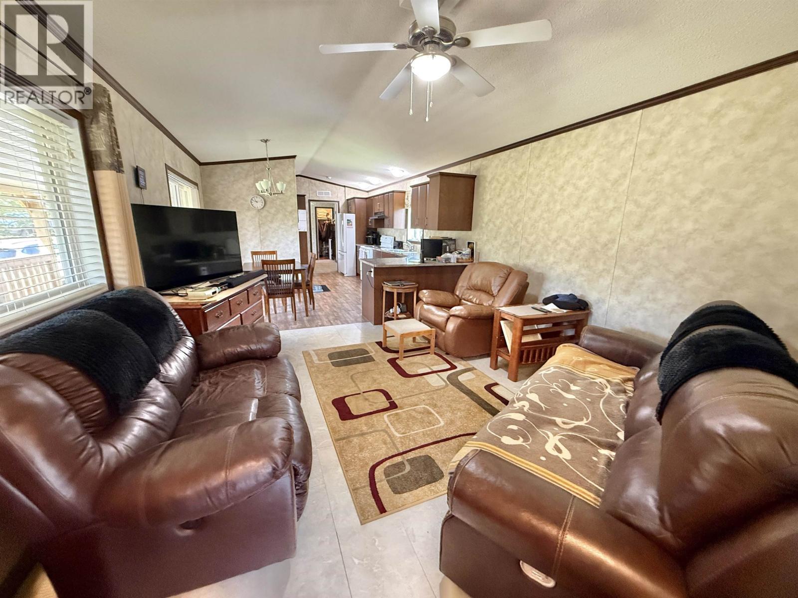 2305 Murray Road, Quesnel, BC - Indoor Photo Showing Living Room With Fireplace