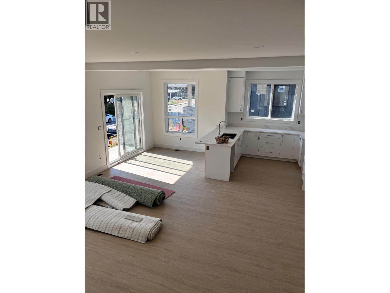 Kitchen dining and living room - 980 Franklyn Road Unit# 3 Lot# 3, Kelowna, BC