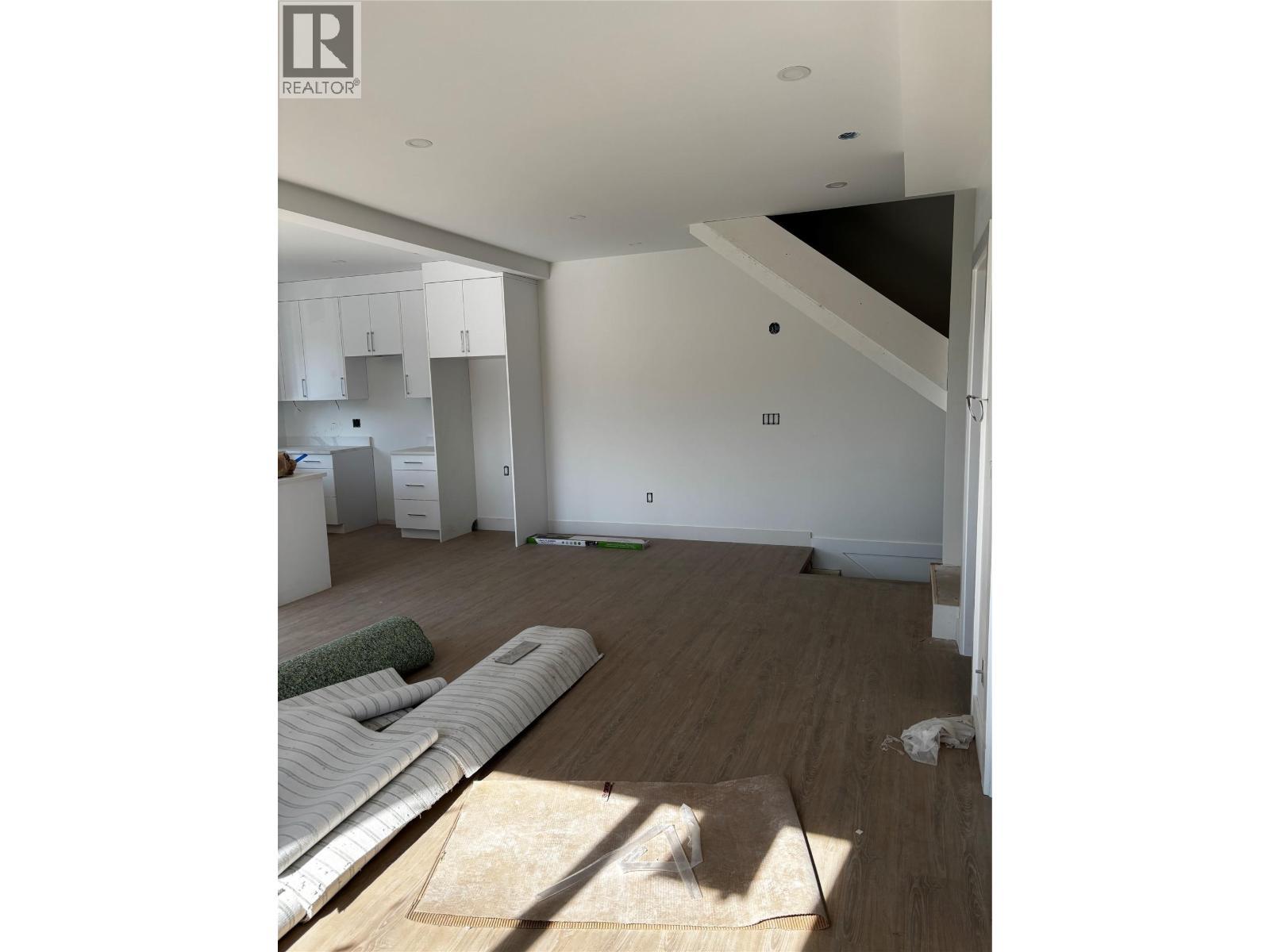 Living room with stairs to 2nd floor bedrooms - 980 Franklyn Road Unit# 3 Lot# 3, Kelowna, BC