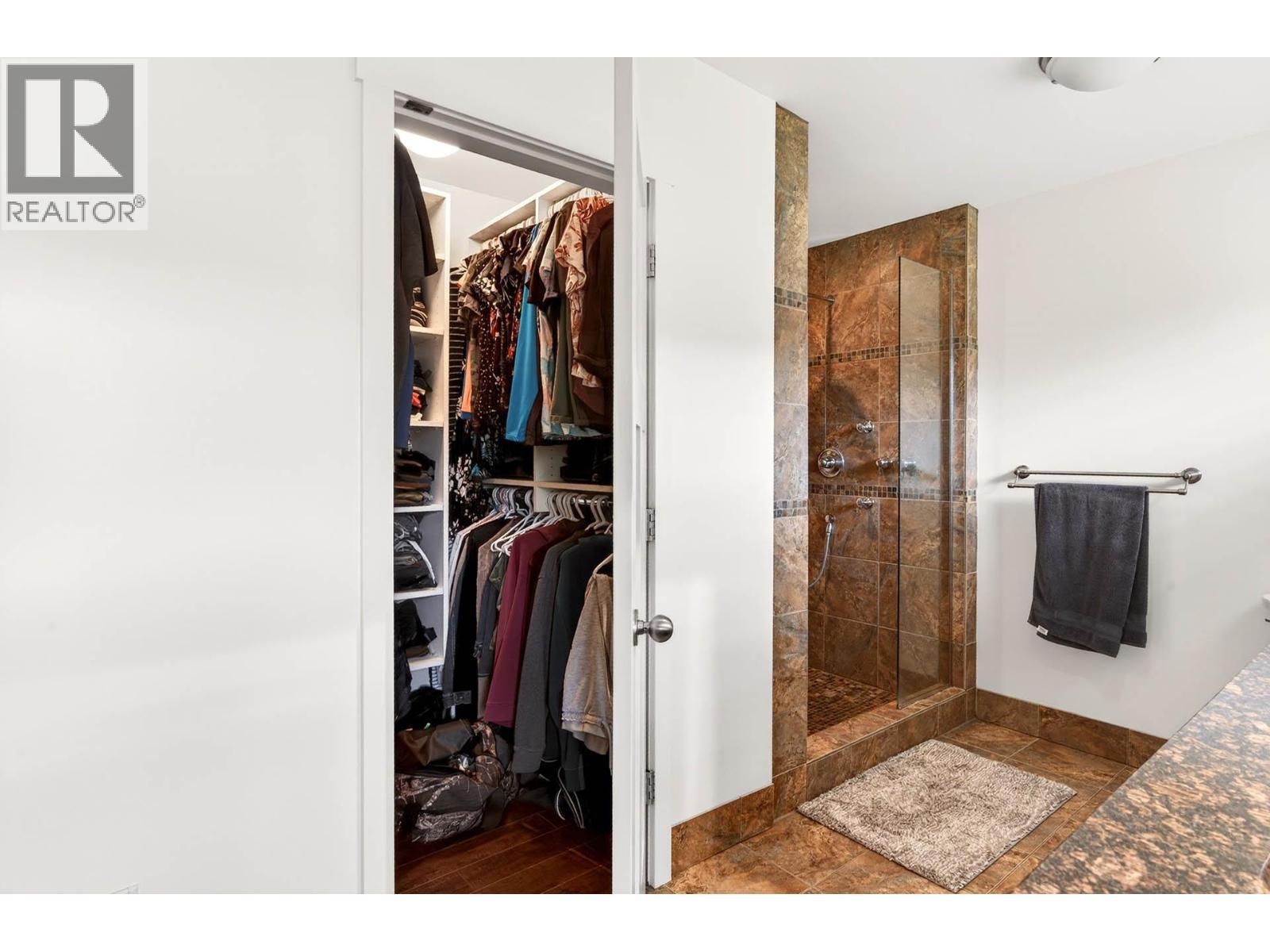 Walk in closet in primary ensuite - 6451 Beaver Crescent, Kamloops, BC