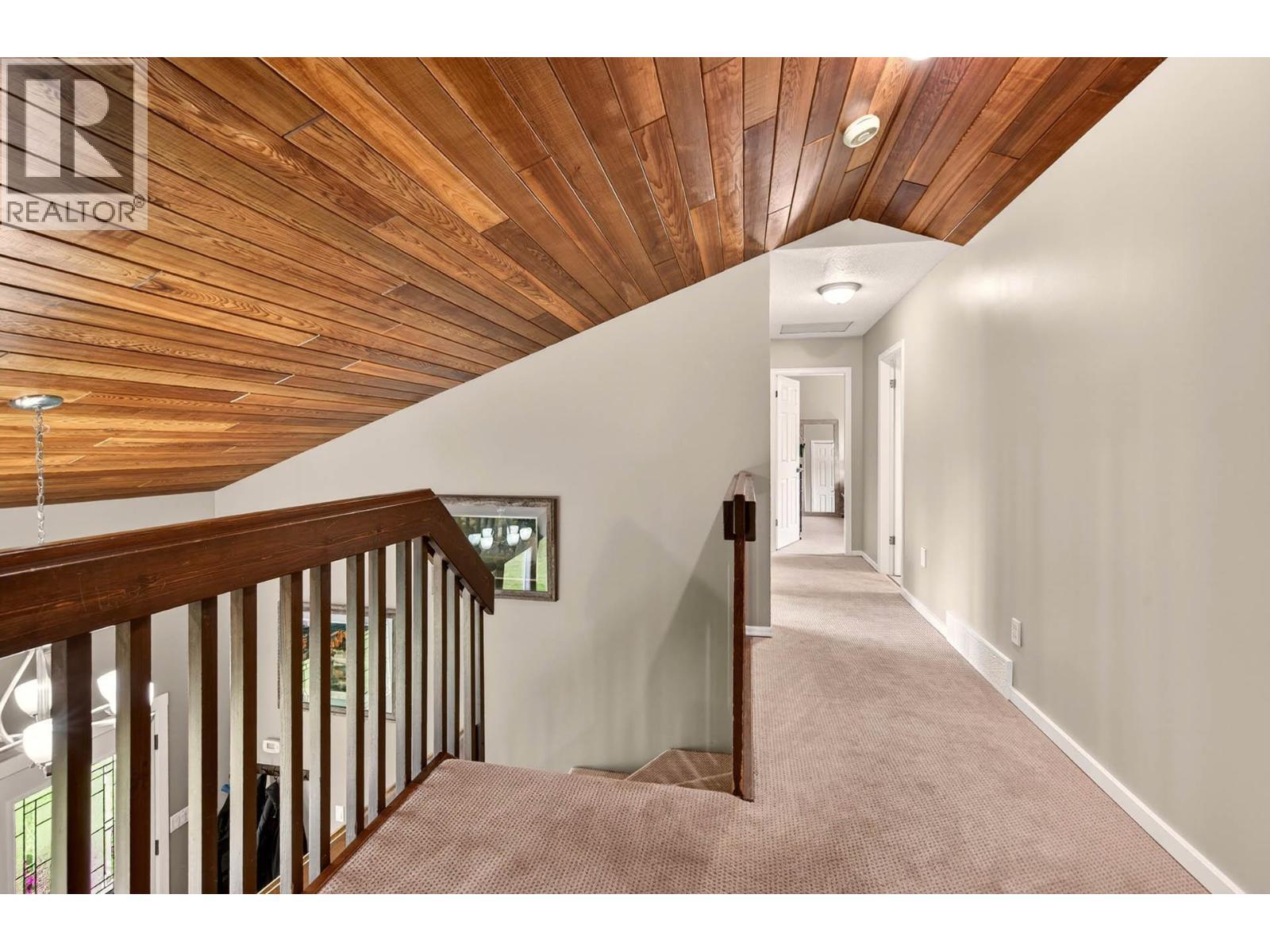 Spacious hallway on upper level - 6451 Beaver Crescent, Kamloops, BC