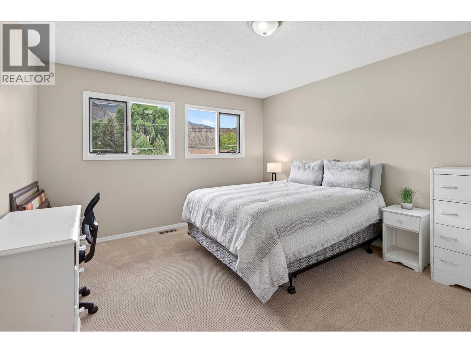 Spacious upper level bdrm at front side of home - 6451 Beaver Crescent, Kamloops, BC