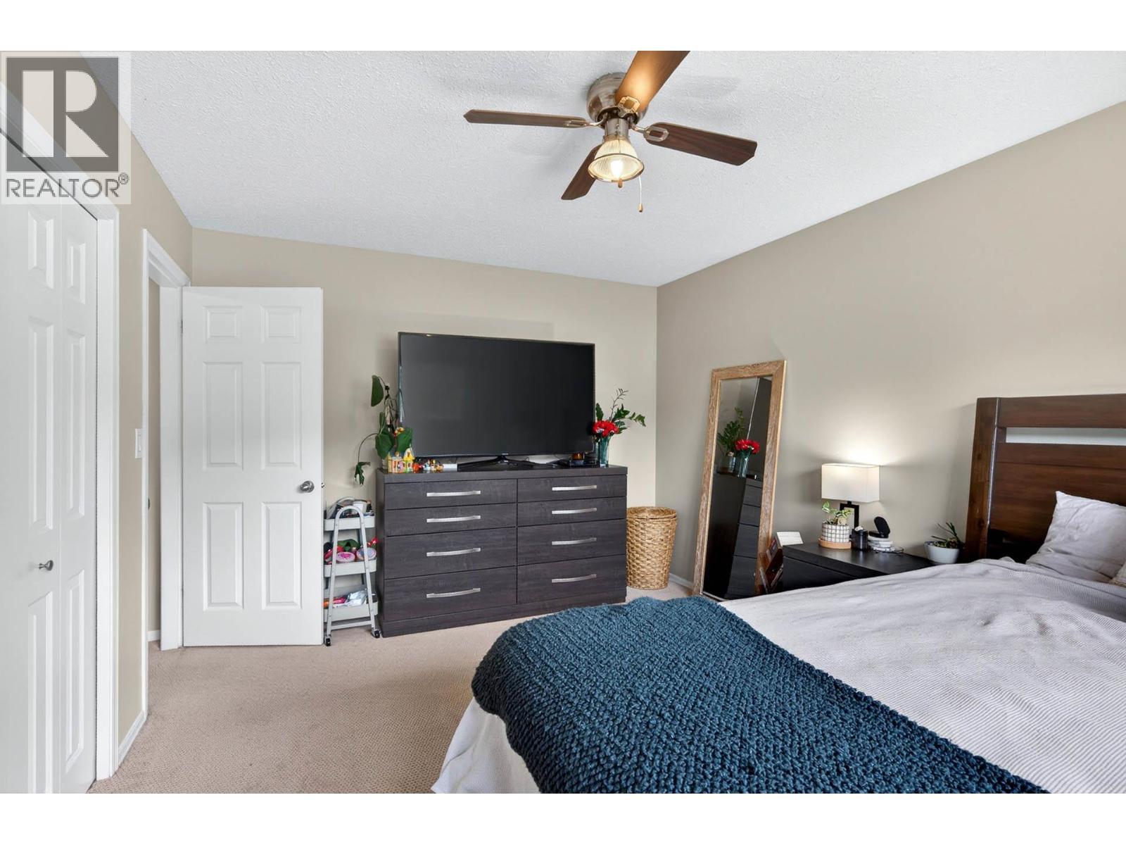 Very spacious bedroom on upper level, back side of home - 6451 Beaver Crescent, Kamloops, BC