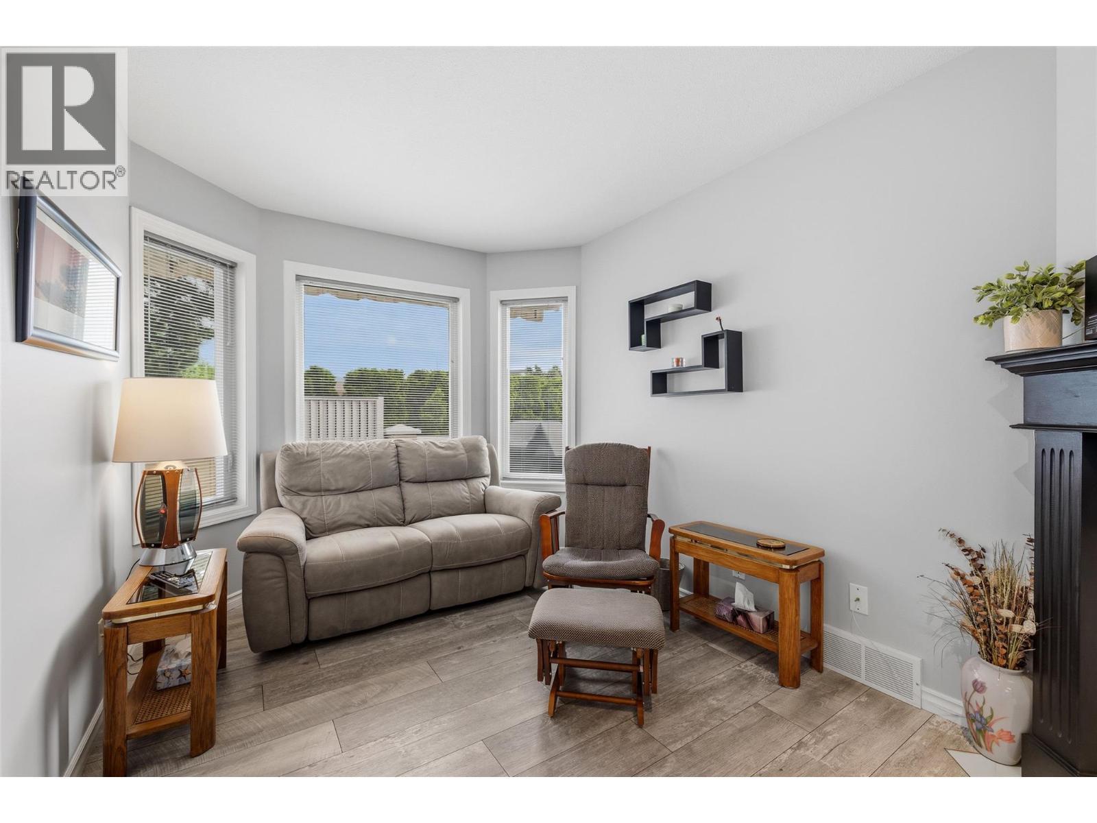 Family Room off of Kitchen w/Gas Fireplace - 2250 Louie Drive Unit# 69, Westbank, BC - Indoor Photo Showing Living Room