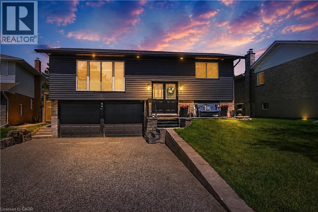 Split-level residence featuring dark siding and stone accents - 44 Oakhurst Crescent, Kitchener, ON - Outdoor