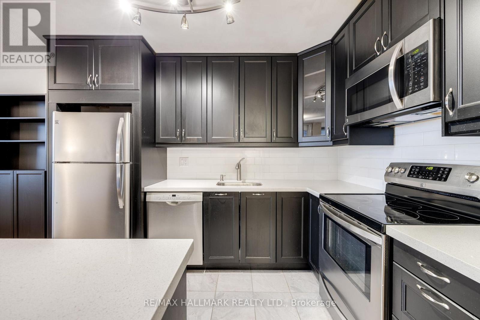1715 - 40 Homewood Avenue, Toronto, ON - Indoor Photo Showing Kitchen With Stainless Steel Kitchen