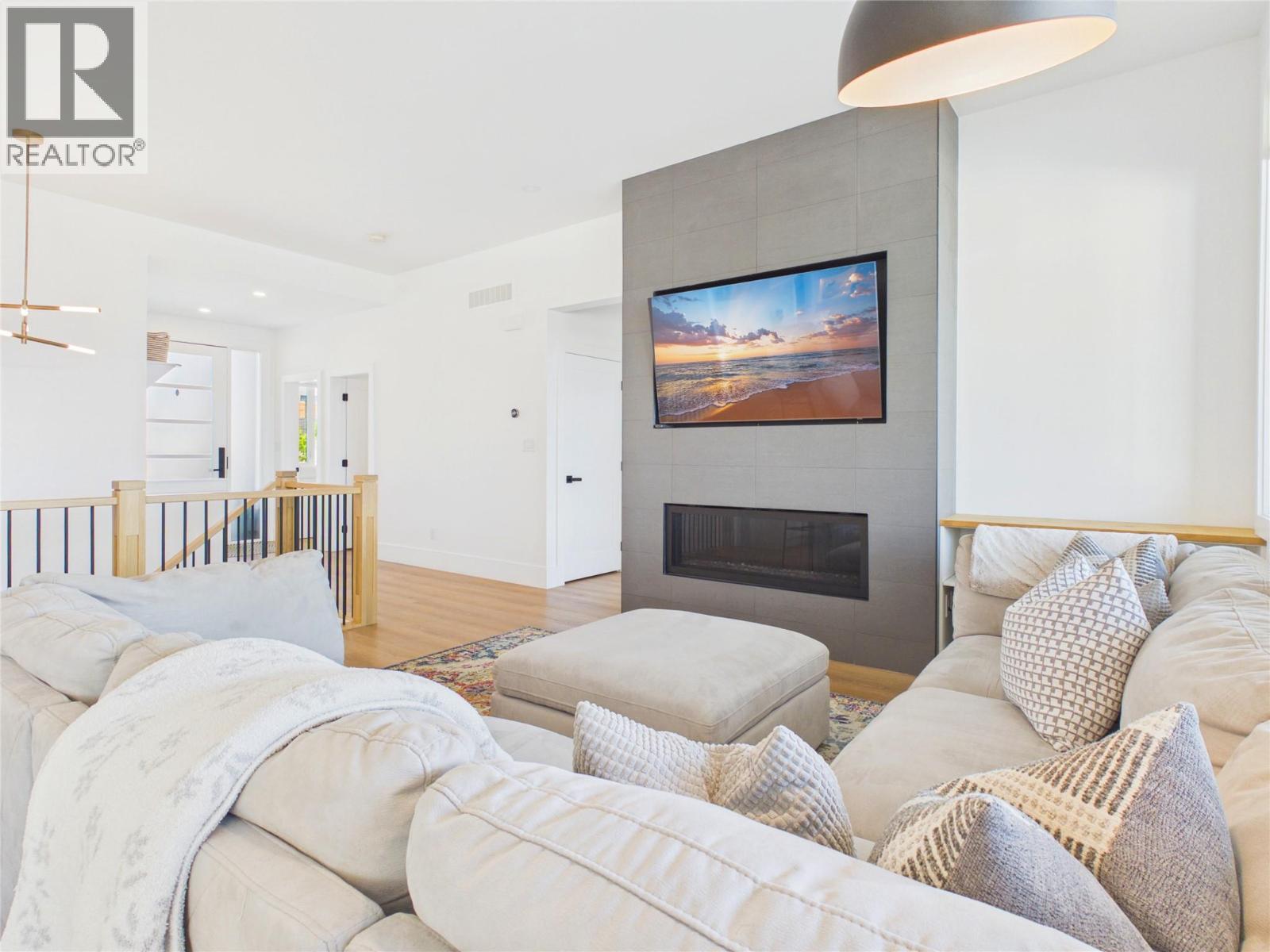 1081 Antler Drive, Penticton, BC - Indoor Photo Showing Living Room With Fireplace