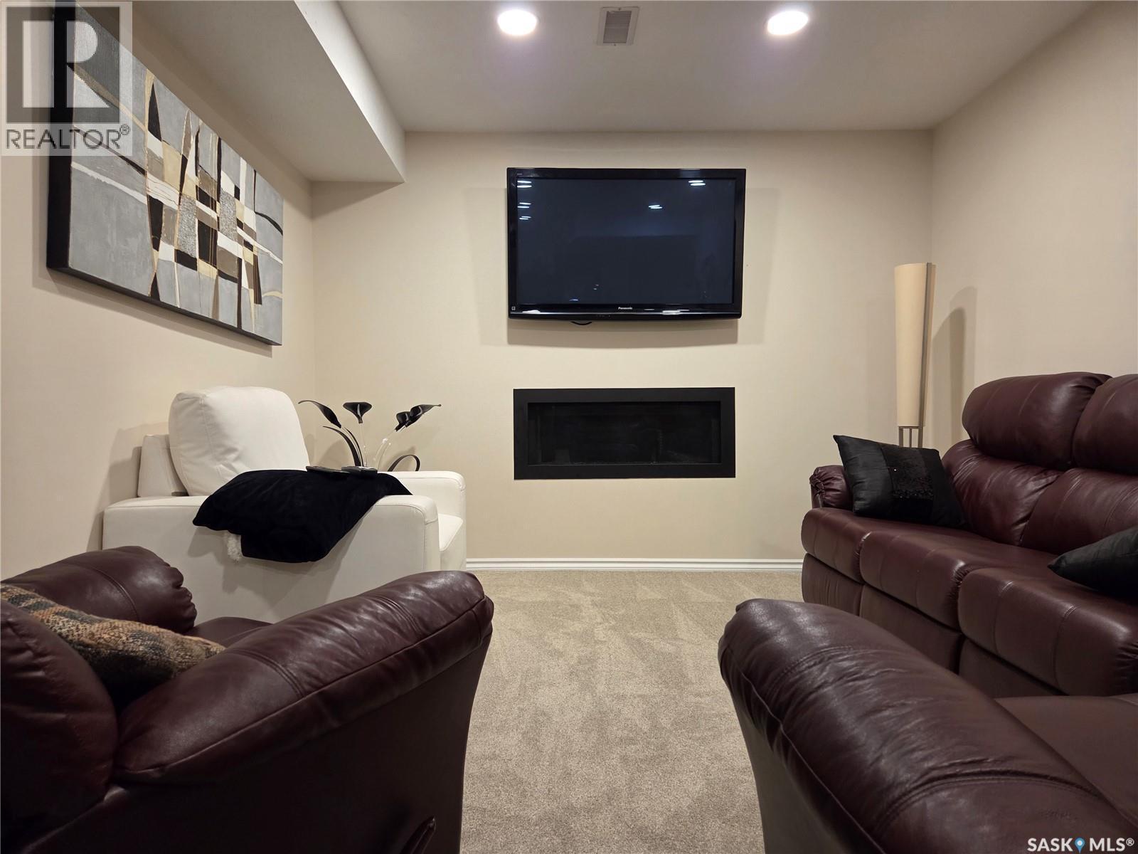 754 Golburn Crescent, Tisdale, SK - Indoor Photo Showing Living Room With Fireplace