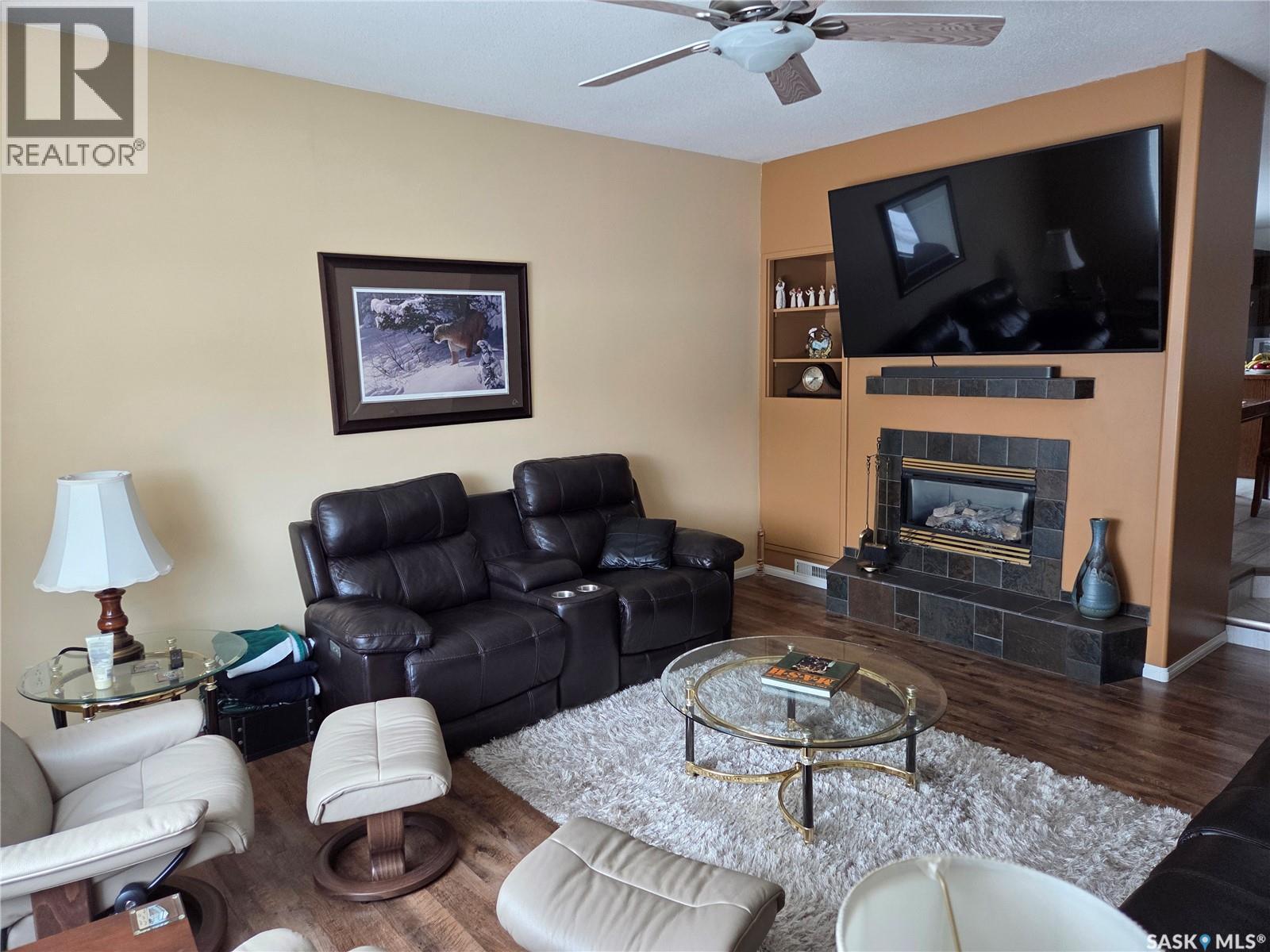 754 Golburn Crescent, Tisdale, SK - Indoor Photo Showing Living Room With Fireplace