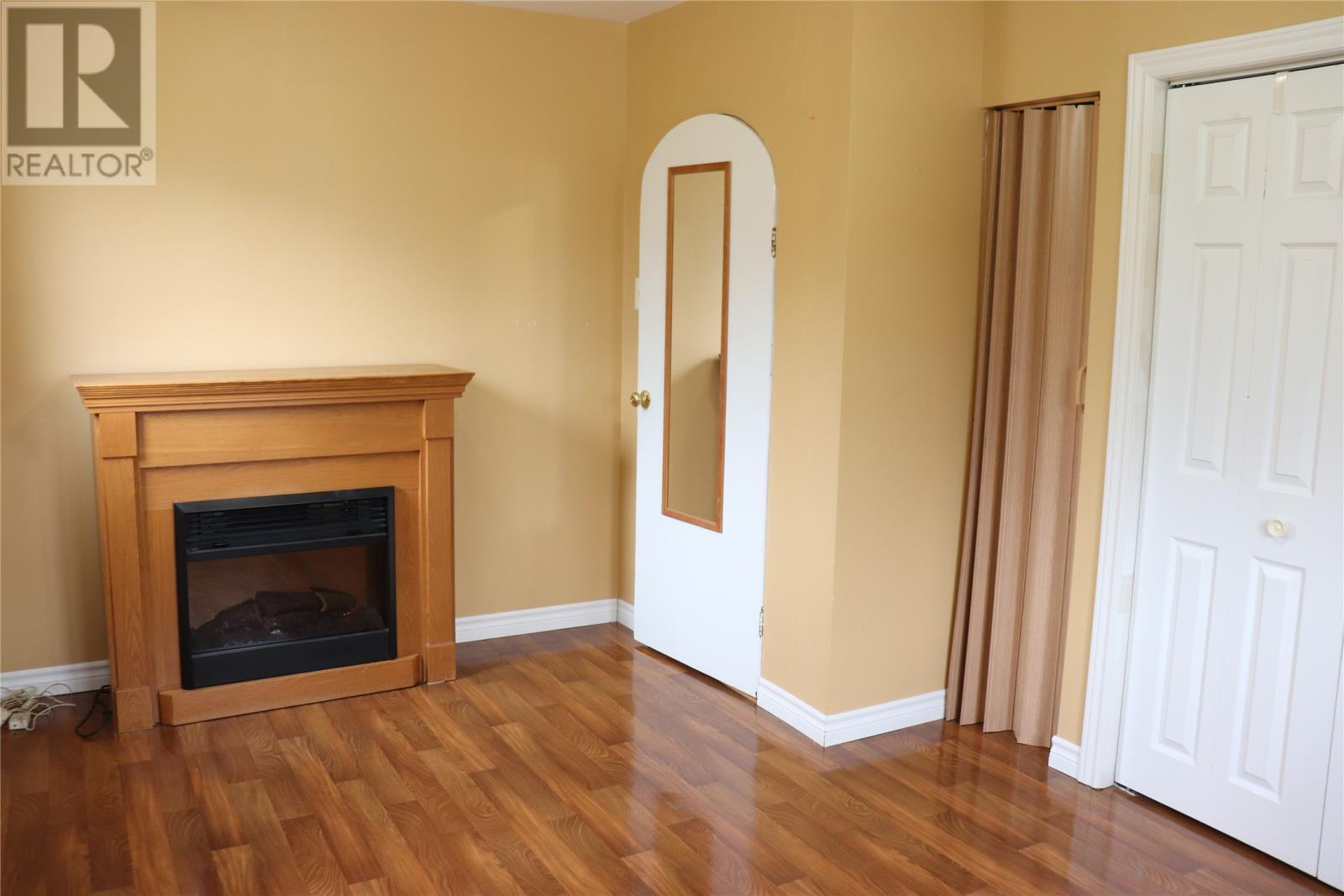 101 Queen Street, Stephenville, NL - Indoor Photo Showing Living Room With Fireplace