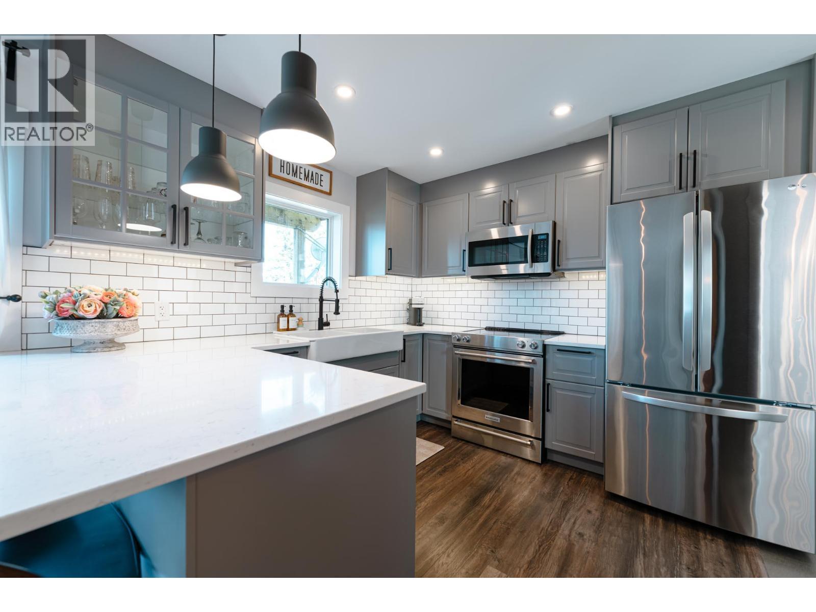 Cabinetry and Appliances in Suite - 8420 Highway 23 Highway S Lot# 1, Revelstoke, BC - Indoor Photo Showing Kitchen With Upgraded Kitchen