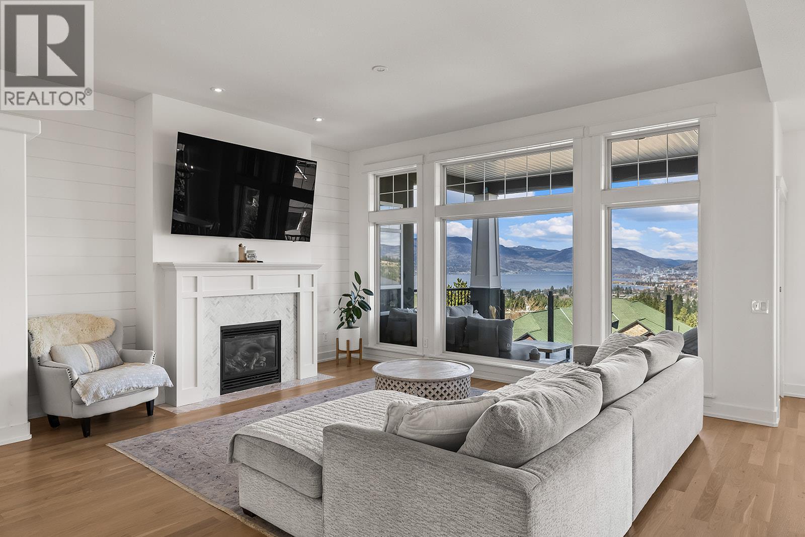 Living - 629 Almandine Court, Kelowna, BC - Indoor Photo Showing Living Room With Fireplace