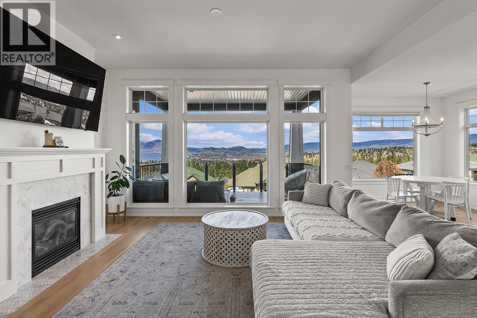 Living - 629 Almandine Court, Kelowna, BC - Indoor Photo Showing Living Room With Fireplace