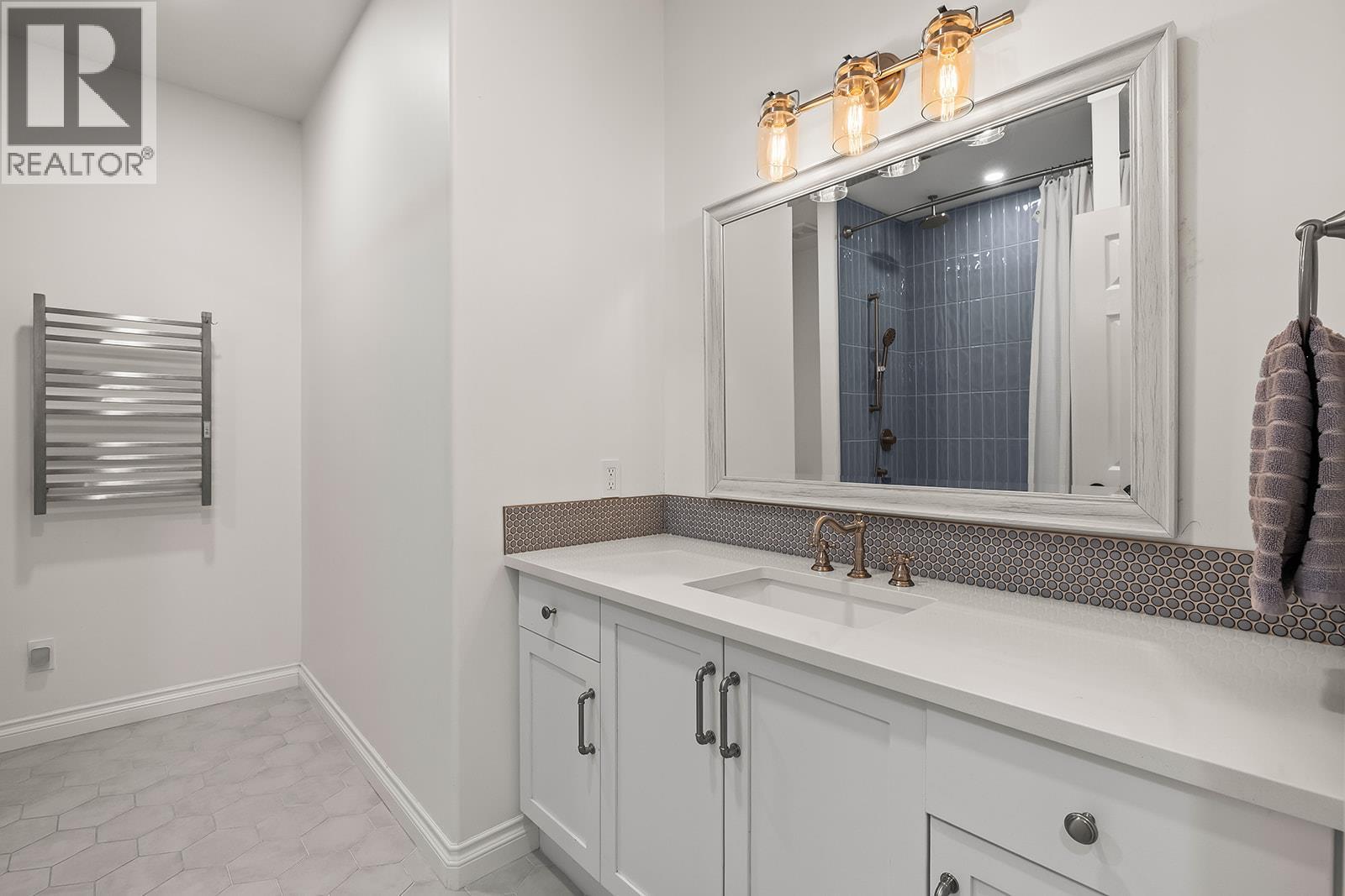 Lower Level Second Bathroom - 629 Almandine Court, Kelowna, BC - Indoor Photo Showing Bathroom