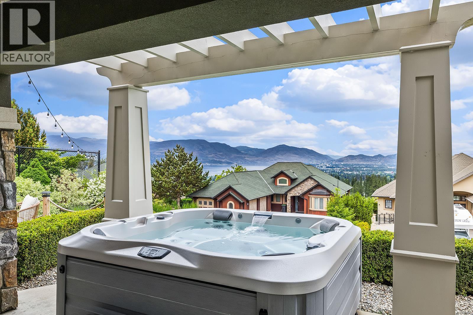 Lower Level Patio with Hot Tub - 629 Almandine Court, Kelowna, BC - Outdoor