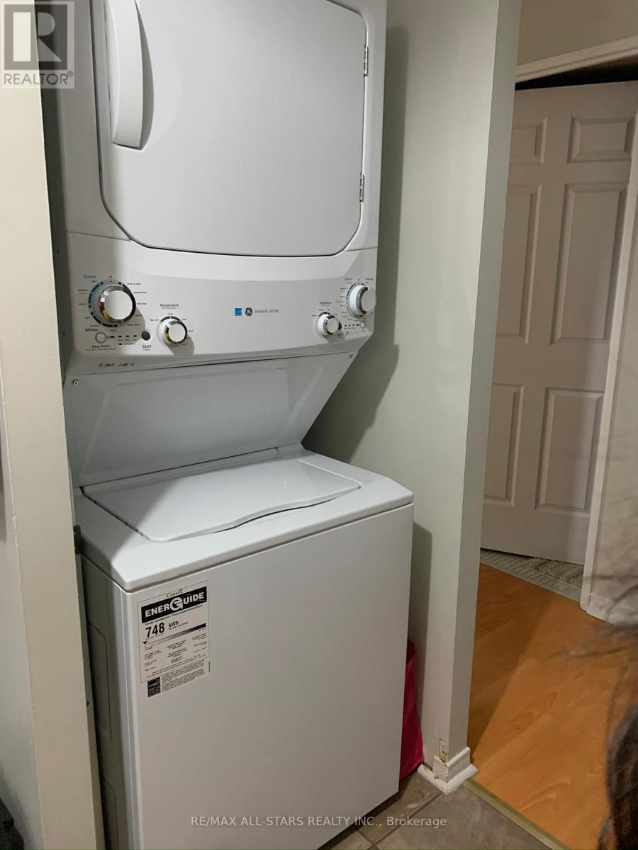 802 - 10 Tapscott Road, Toronto, ON - Indoor Photo Showing Laundry Room