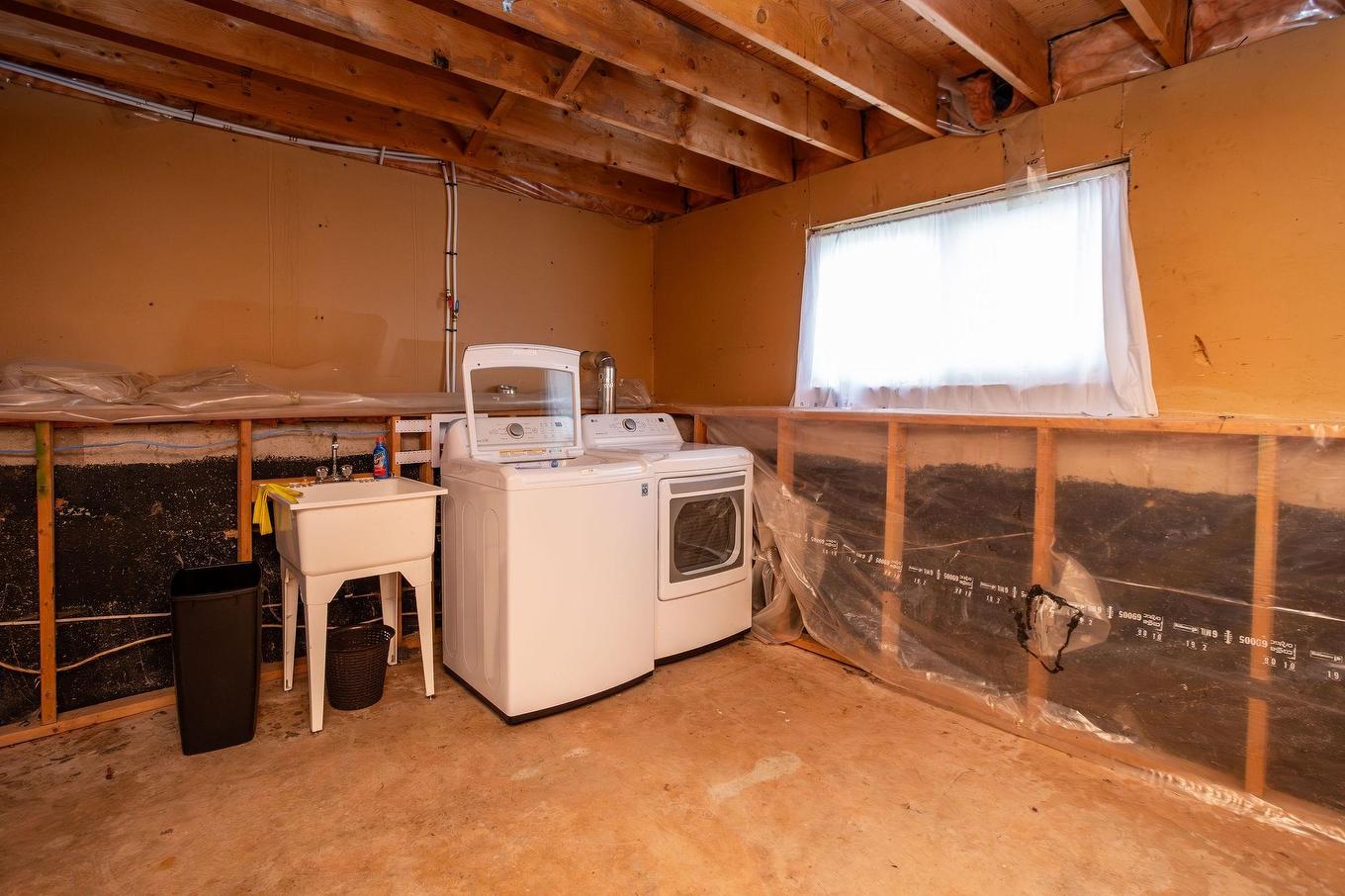 1 Anniversary Avenue, Souris, PE - Indoor Photo Showing Laundry Room