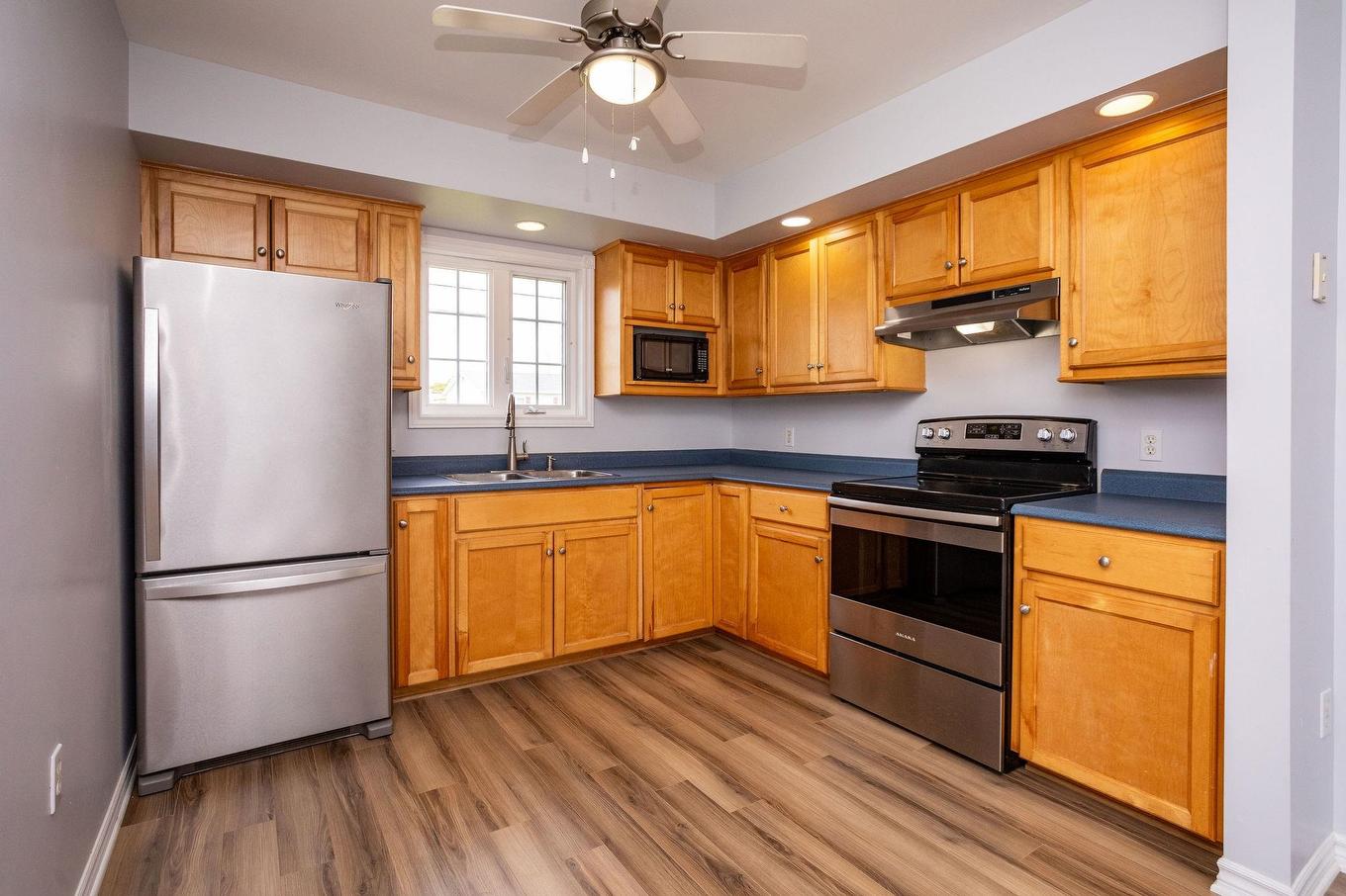 1 Anniversary Avenue, Souris, PE - Indoor Photo Showing Kitchen With Double Sink