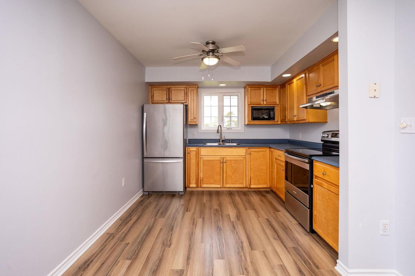 1 Anniversary Avenue, Souris, PE - Indoor Photo Showing Kitchen With Double Sink