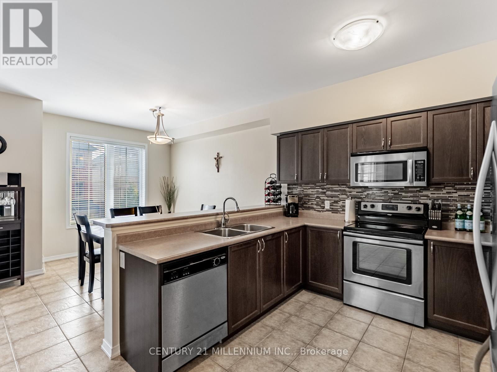 111 Cedar Lake Crescent, Brampton, ON - Indoor Photo Showing Kitchen With Double Sink