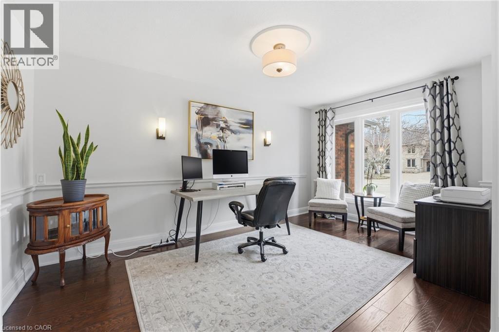 Office with dark wood-style floors - 28 Deerview Avenue, Ancaster, ON