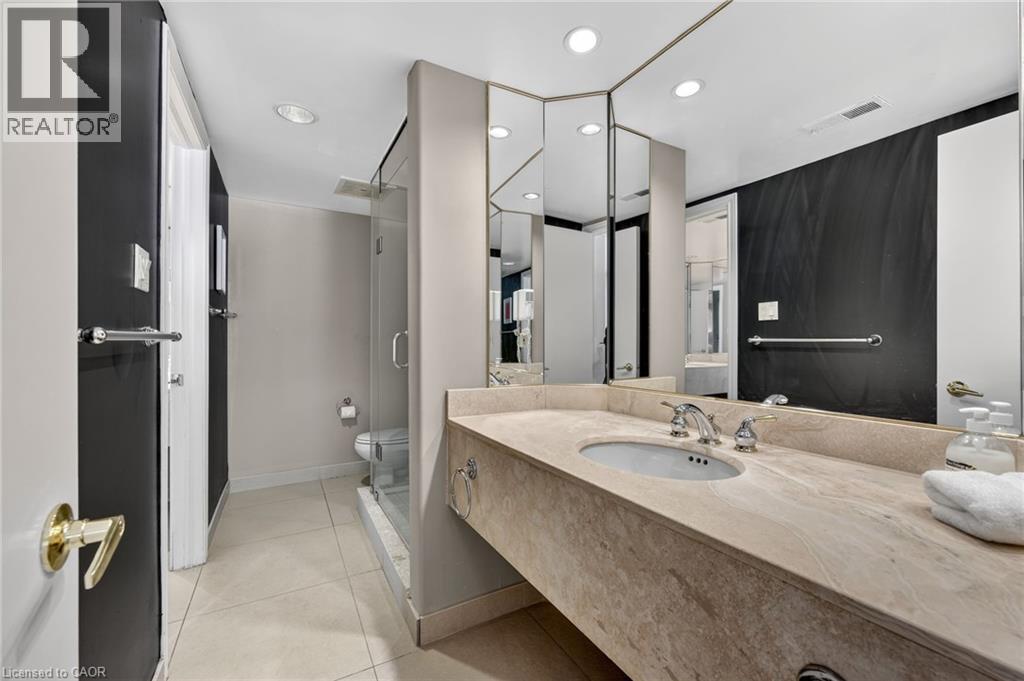 Bathroom with vanity, a stall shower, recessed lighting, and light tile patterned floors - 90 Highland Drive Unit# 2014/15, Simcoe, ON