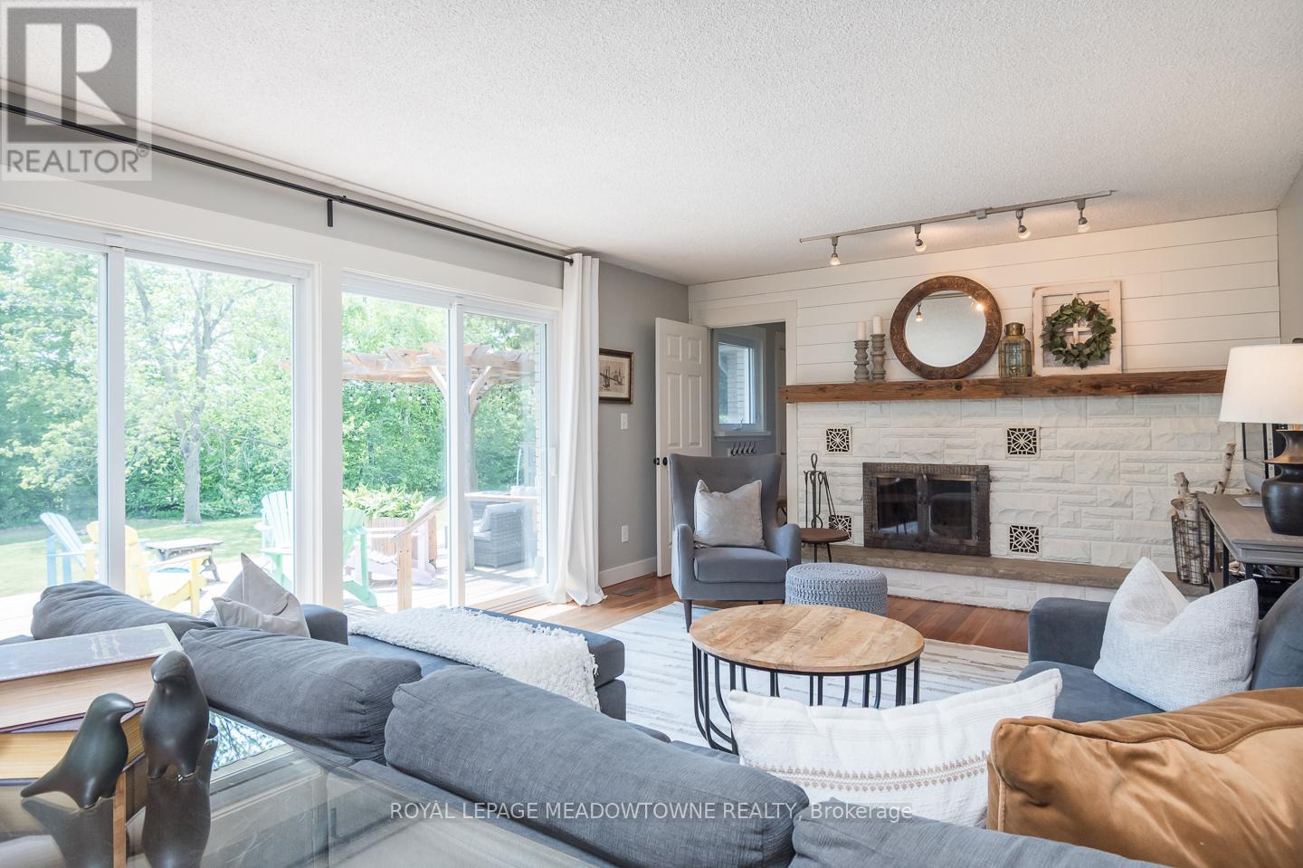 Enjoy the crackle of the wood burning fireplace - 11276 Amos Drive, Milton, ON