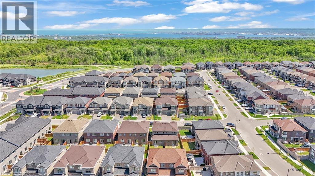 Aerial perspective showcasing a residential community with varied architectural styles - 101 Westfield Crescent, Waterdown, ON