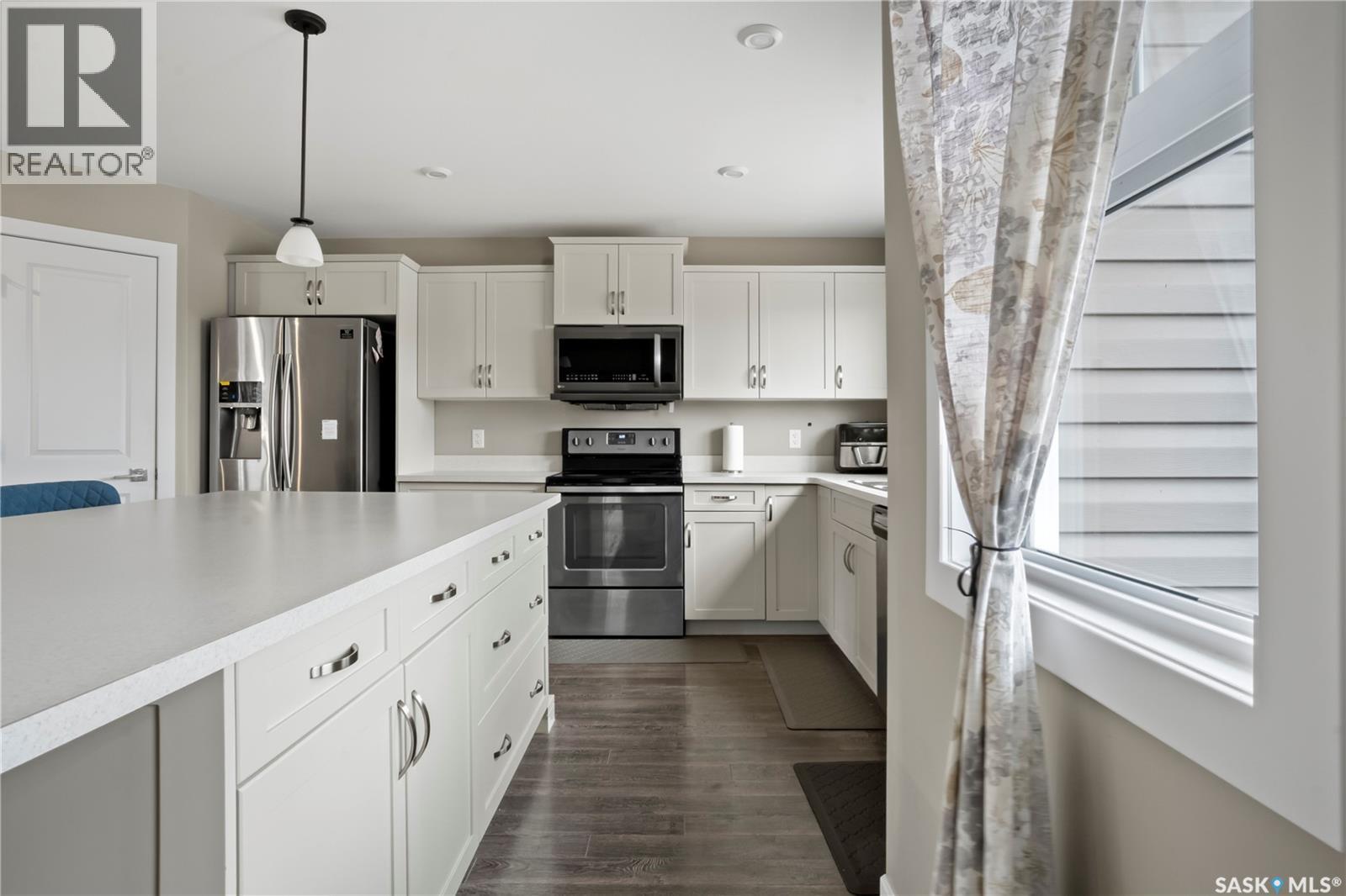 4073 Delhaye Way, Regina, SK - Indoor Photo Showing Kitchen With Stainless Steel Kitchen