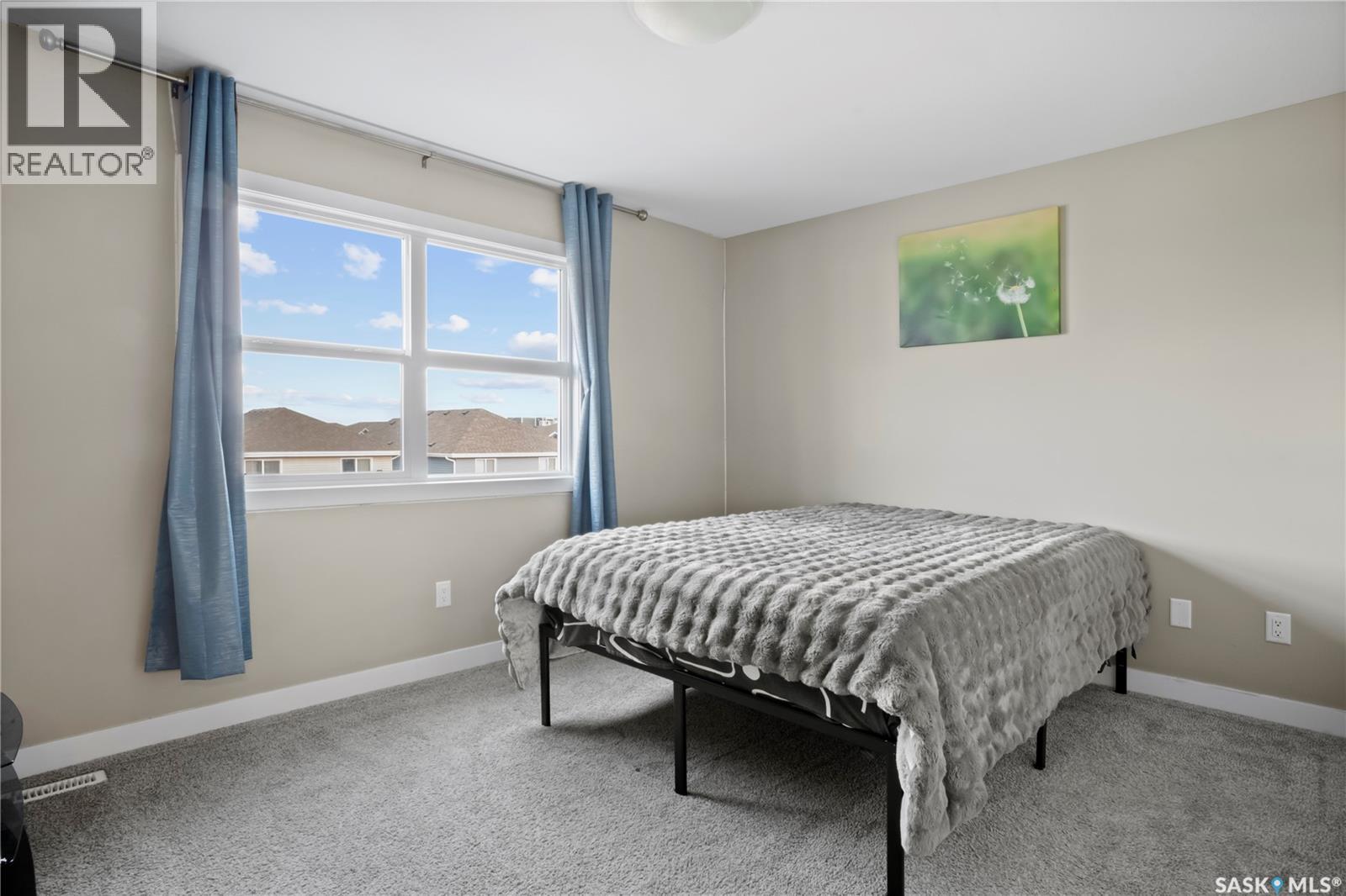 4073 Delhaye Way, Regina, SK - Indoor Photo Showing Bedroom