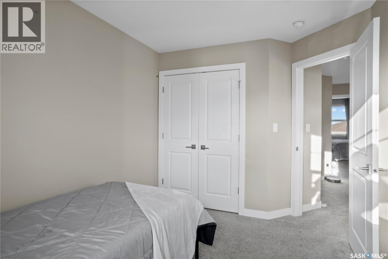 4073 Delhaye Way, Regina, SK - Indoor Photo Showing Bedroom