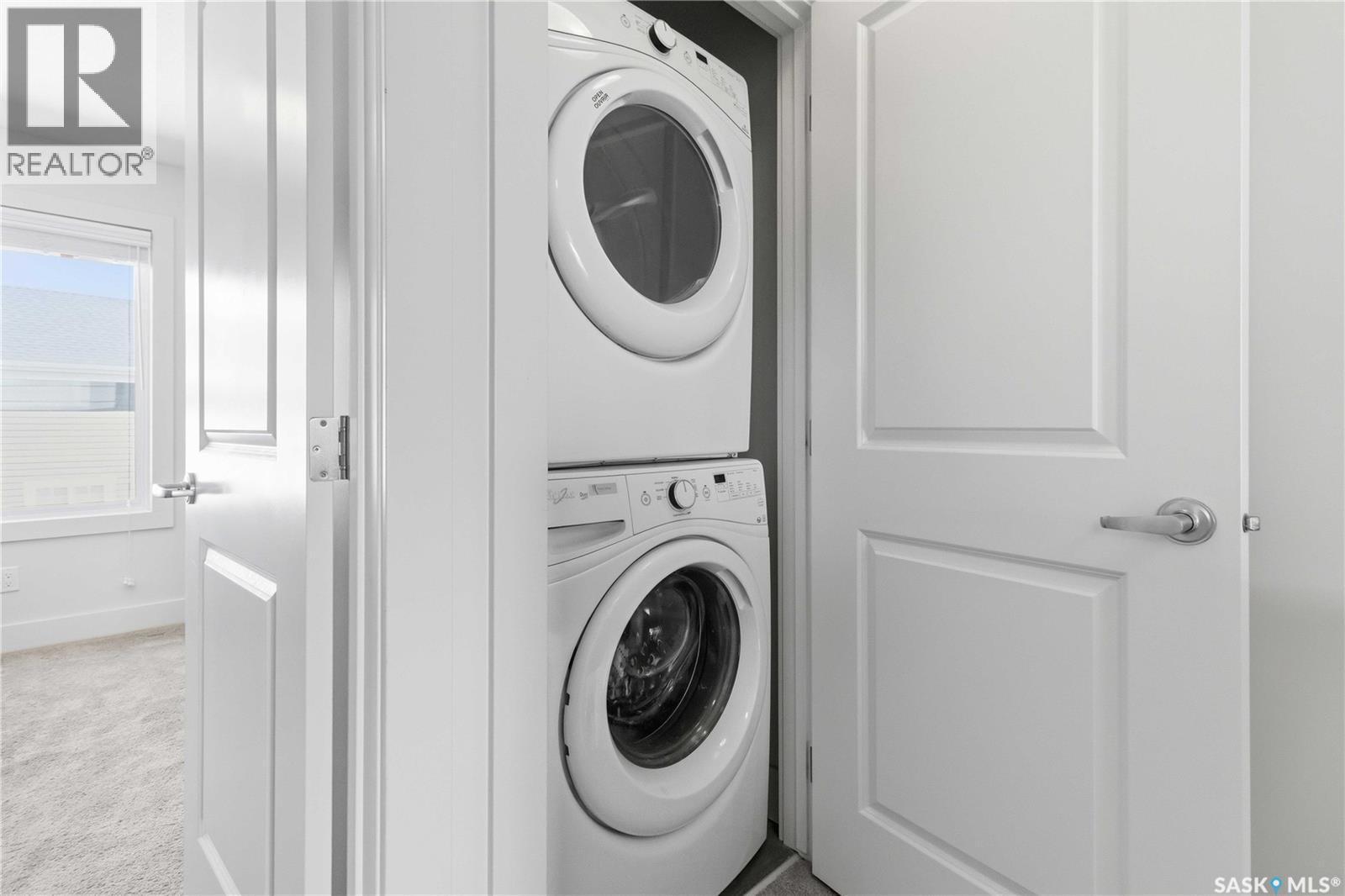 711 Meadows Boulevard, Saskatoon, SK - Indoor Photo Showing Laundry Room