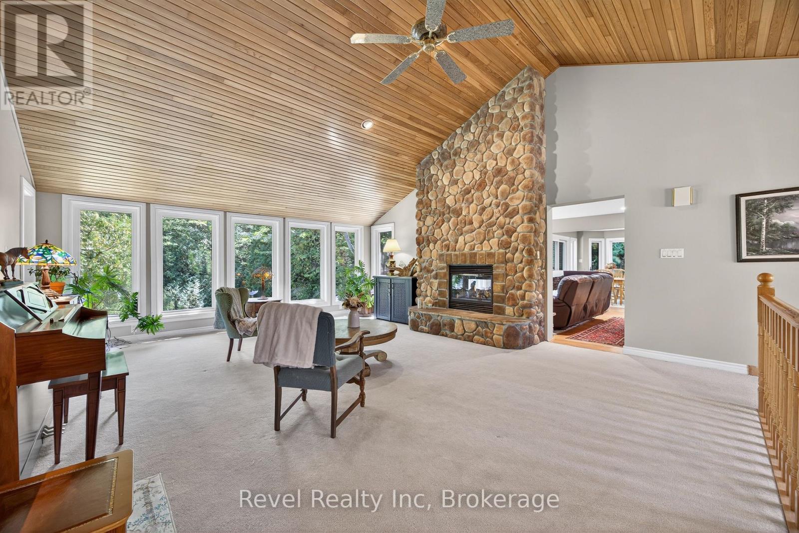 7190 93 Highway, Tiny, ON - Indoor With Fireplace