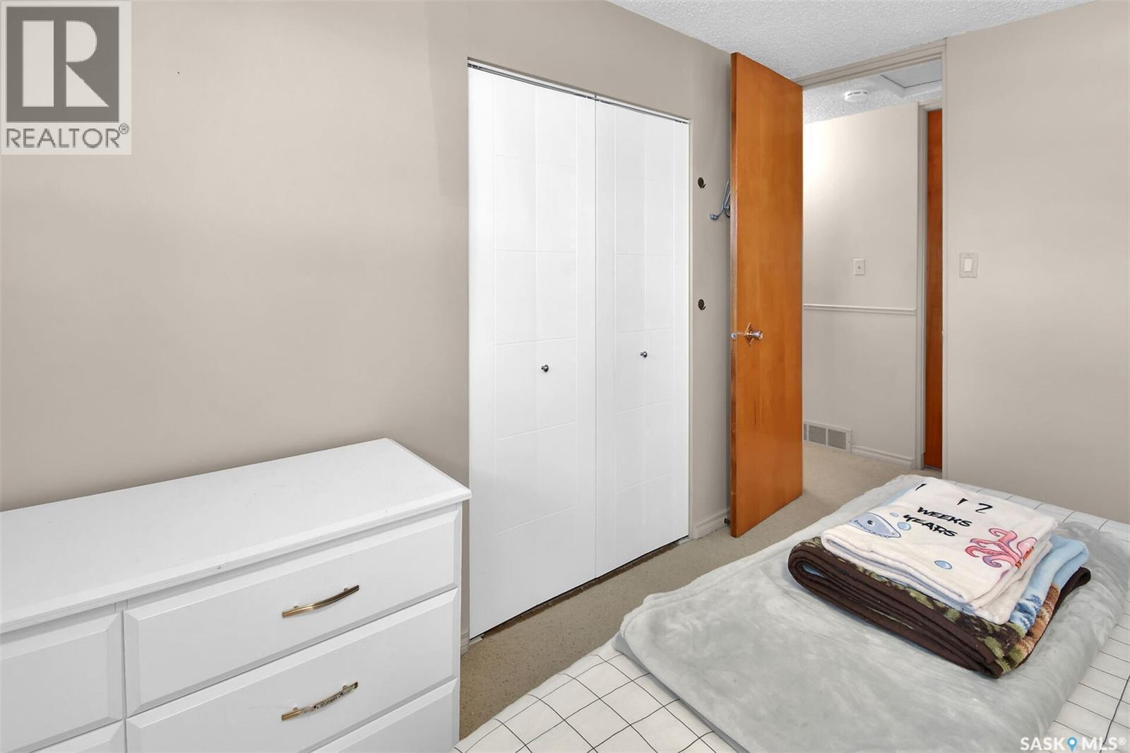 63 Spinks Drive, Saskatoon, SK - Indoor Photo Showing Bedroom