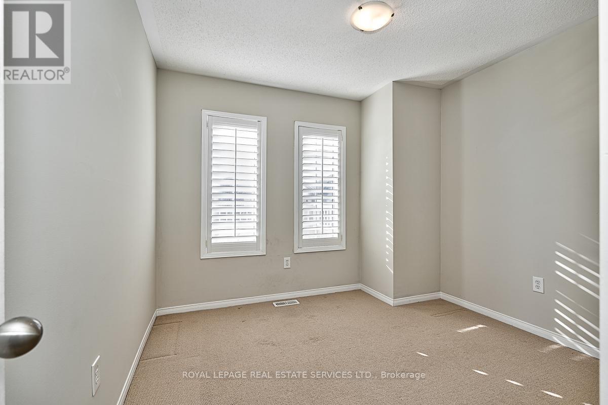 Third Bedroom w/Broadloom & California Shutters - 3221 Sharp Road, Burlington, ON - Indoor Photo Showing Other Room