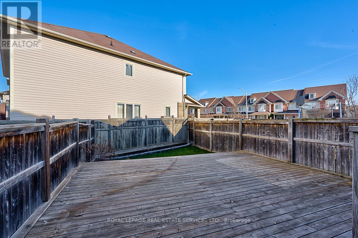 Fully Fenced Backyard with an Oversized Deck - 3221 Sharp Road, Burlington, ON - Outdoor With Deck Patio Veranda With Exterior