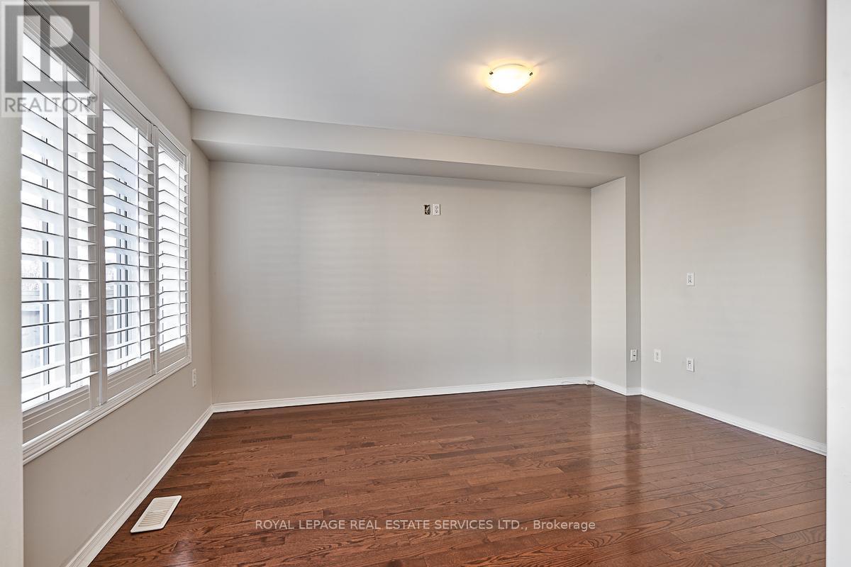 Sought-After Separate Family Room w/Hardwood Floor - 3221 Sharp Road, Burlington, ON - Indoor Photo Showing Other Room