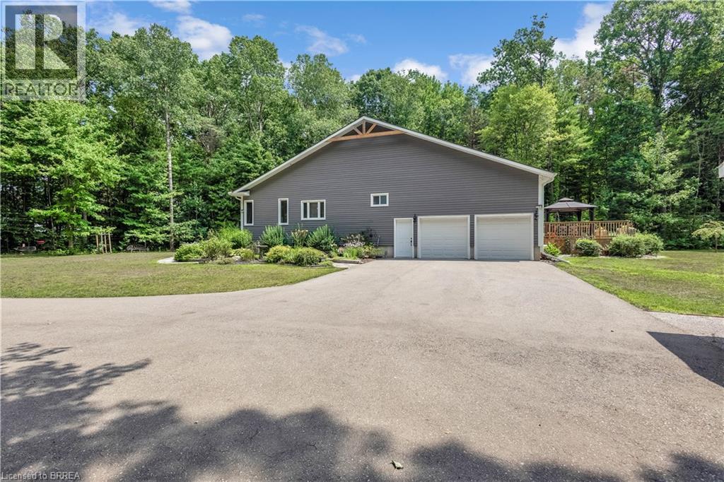 Custom Built Home in a Woodland Wonderland - 156 St Johns Road W, Simcoe, ON - Outdoor