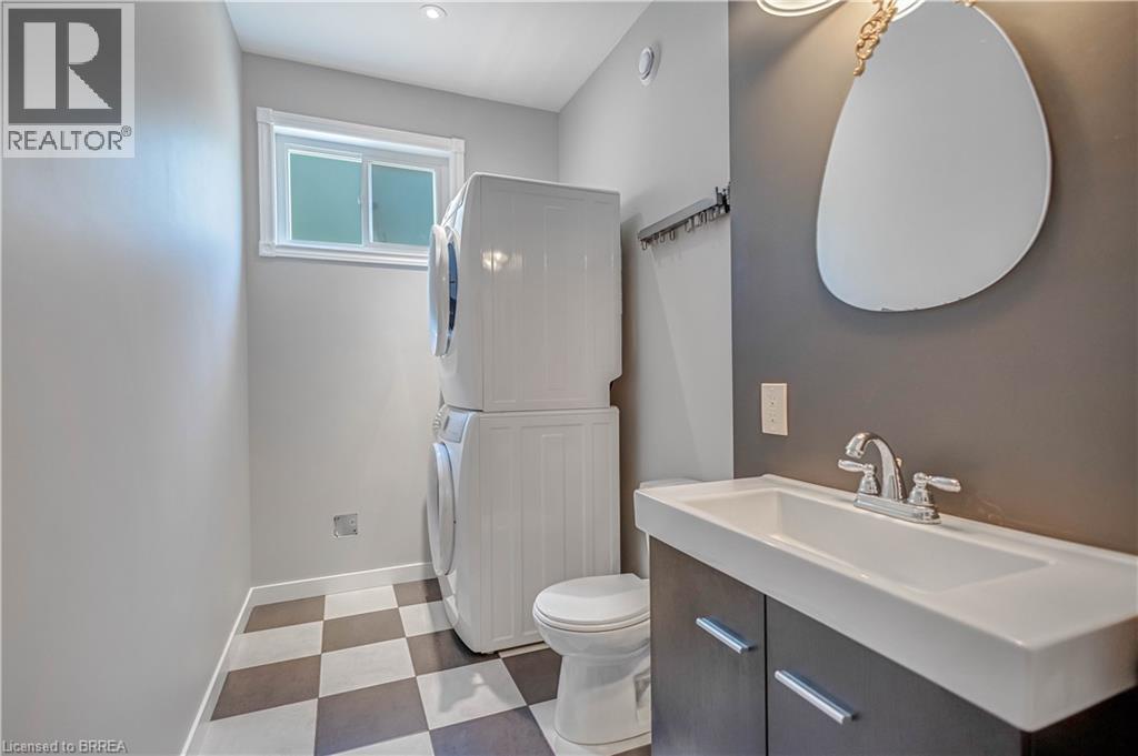 Laundry Room + Powder Bathroom Main Level - 156 St Johns Road W, Simcoe, ON - Indoor Photo Showing Bathroom