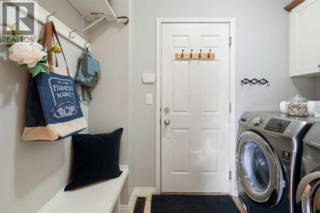 Main floor laundry room - 71 Chaparral Grove Se, Calgary, AB